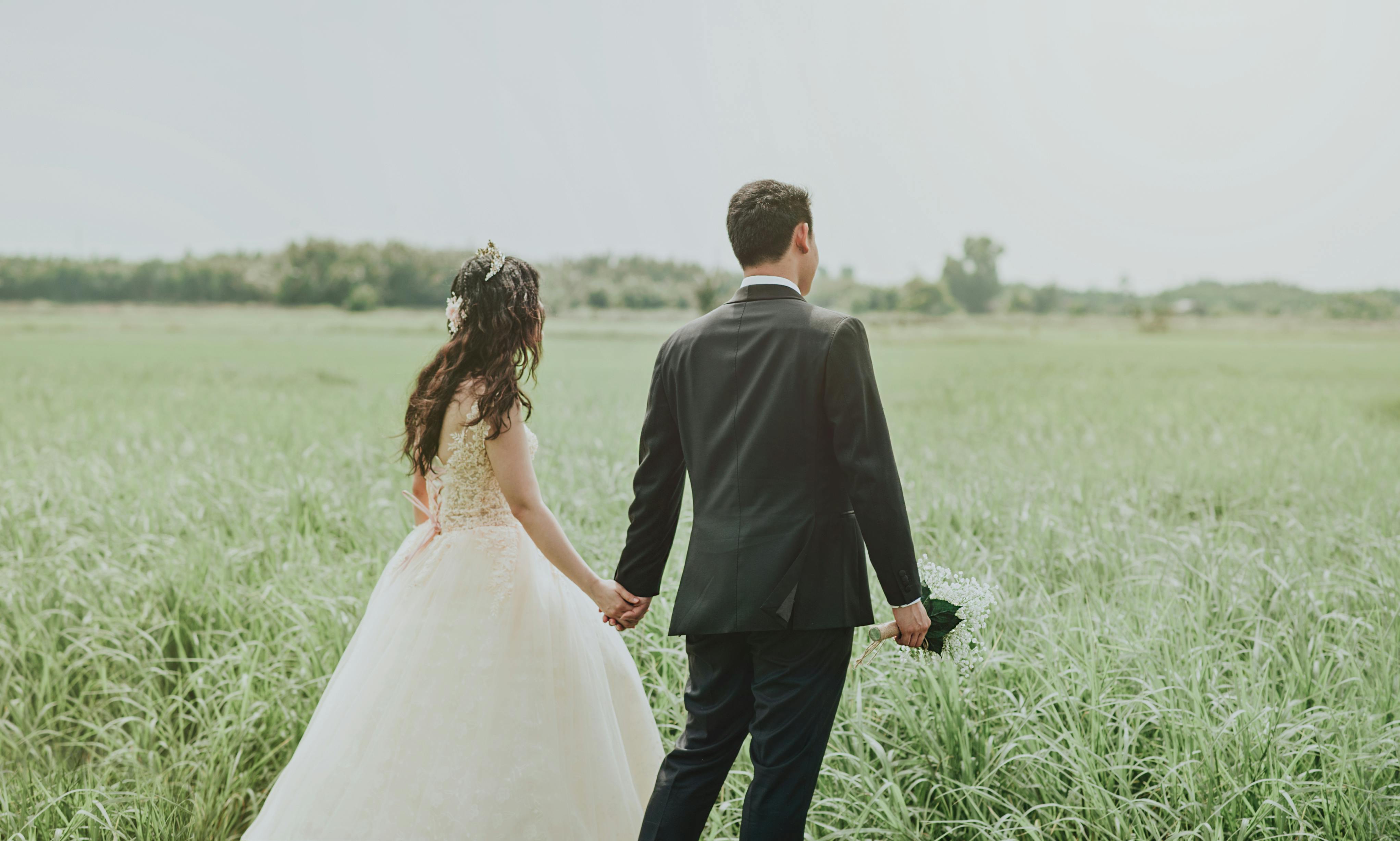 Couple holding hands